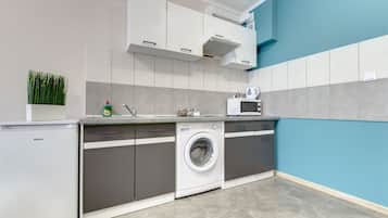 Apartment (3) | Private kitchen | Fridge, stovetop, electric kettle, cookware/dishes/utensils