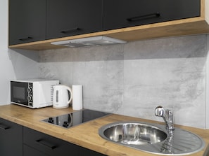 Căn hộ (21B) | Bếp riêng | Tủ lạnh, lò vi sóng, bếp nấu, ấm điện 