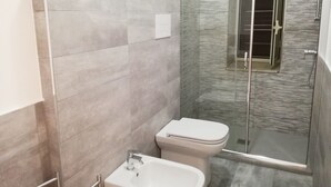 Apartment, 2 Bedrooms | Bathroom | Shower, rainfall showerhead, bidet, towels - Il Giardino Di Lucia Bilocale Karma (Gioiosa Marea)
