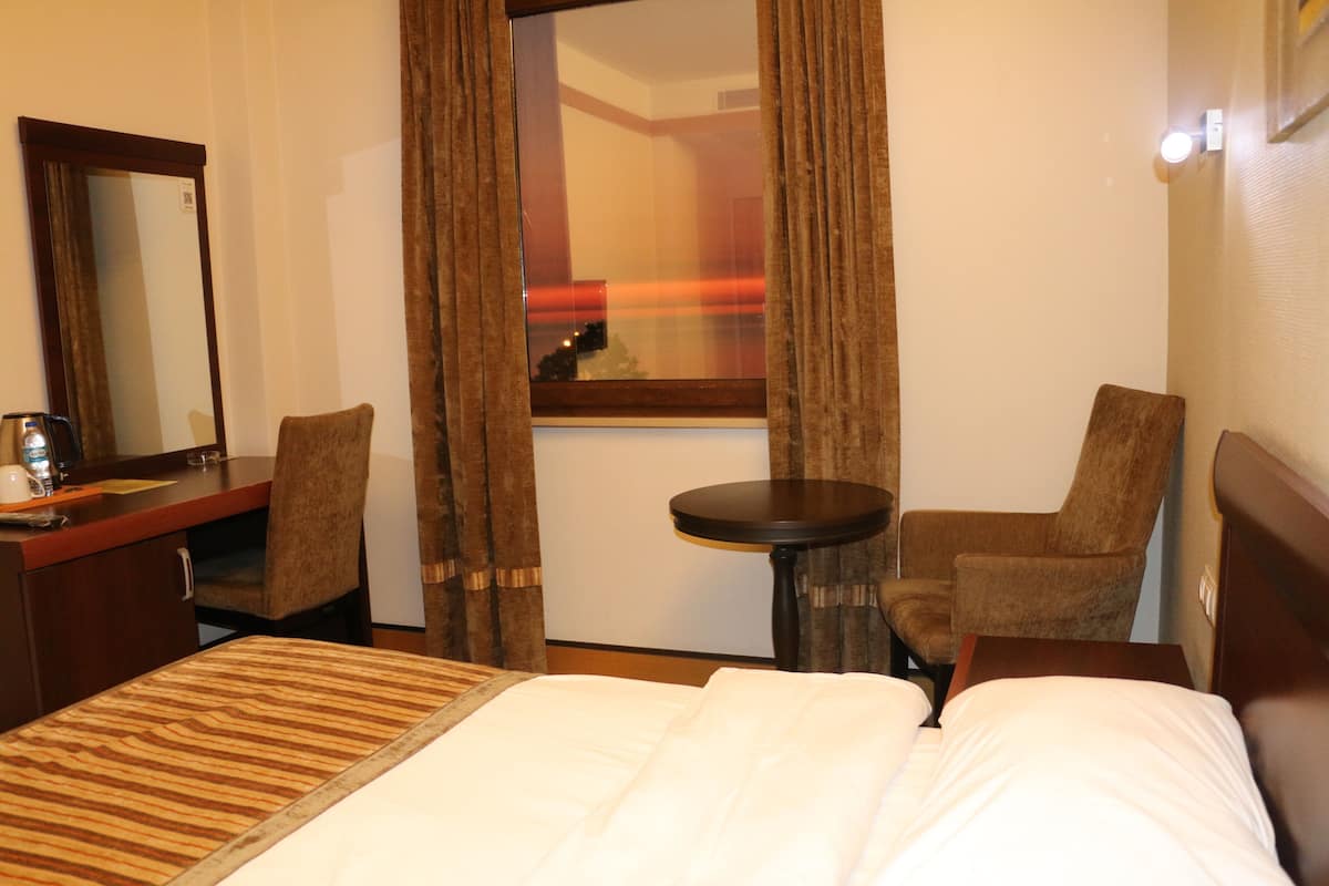 Klassieke eenpersoonskamer | 2 slaapkamers, luxe beddengoed, een minibar, een kluis op de kamer