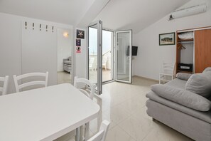 Apartment, 1 Bedroom, Terrace, Sea View (A3) | Living area | Flat-screen TV