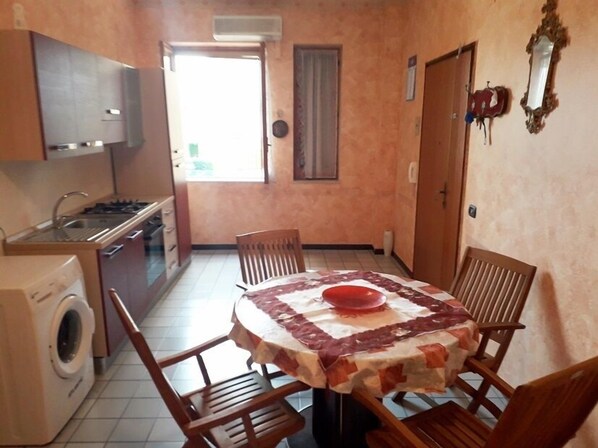 Apartment, 1 Bedroom | Private kitchenette | Full-sized fridge, oven, stovetop, cookware/dishes/utensils