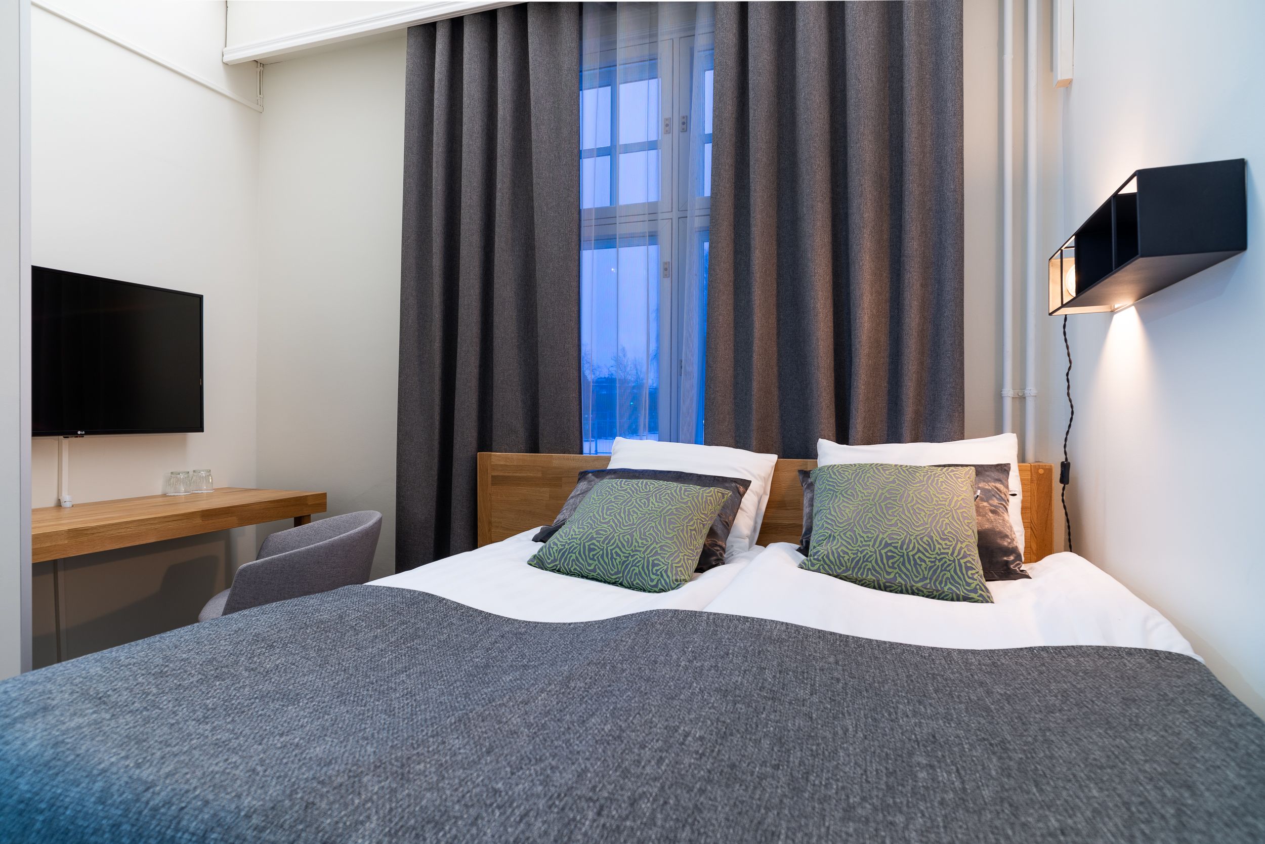 Desk, blackout drapes, soundproofing, iron/ironing board