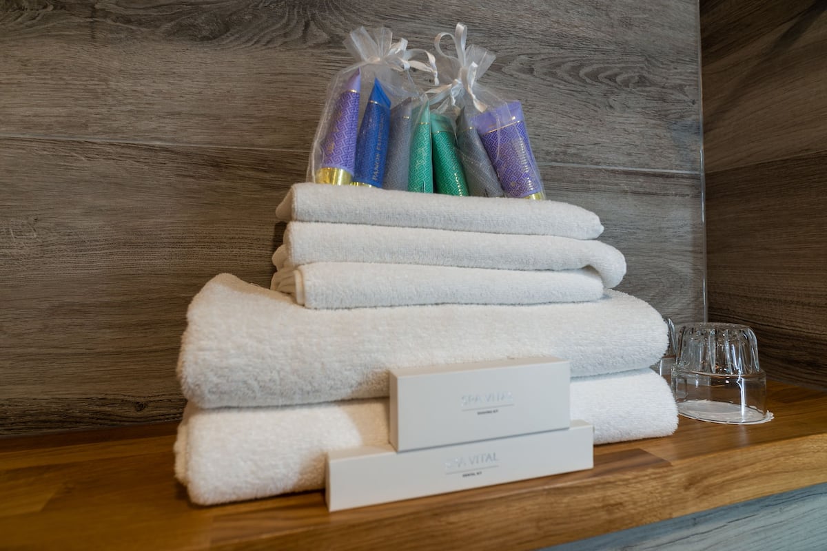 junior suite, 1 king bed | bathroom | shower, rainfall showerhead, designer toiletries, hair dryer