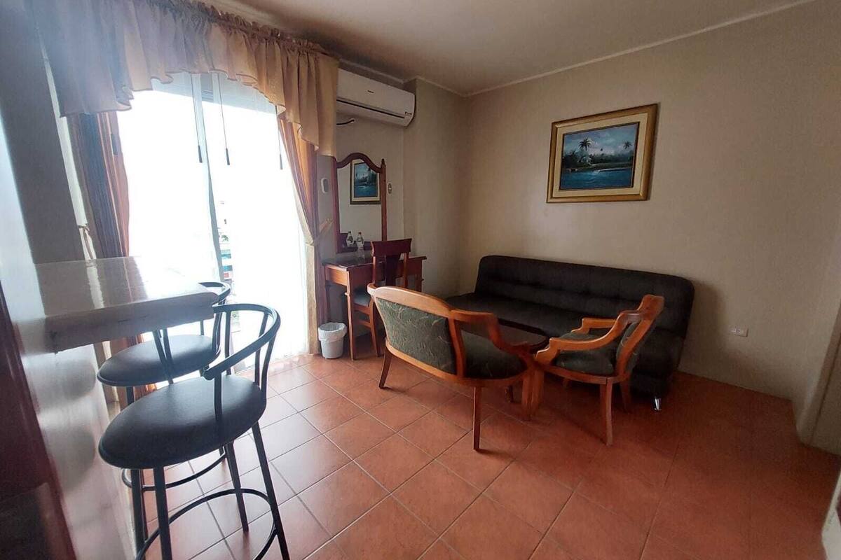 junior suite, 1 queen bed, non smoking | in-room safe, free wifi, bed sheets