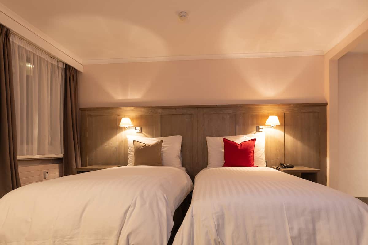 twin room | minibar, desk, blackout curtains, iron/ironing board