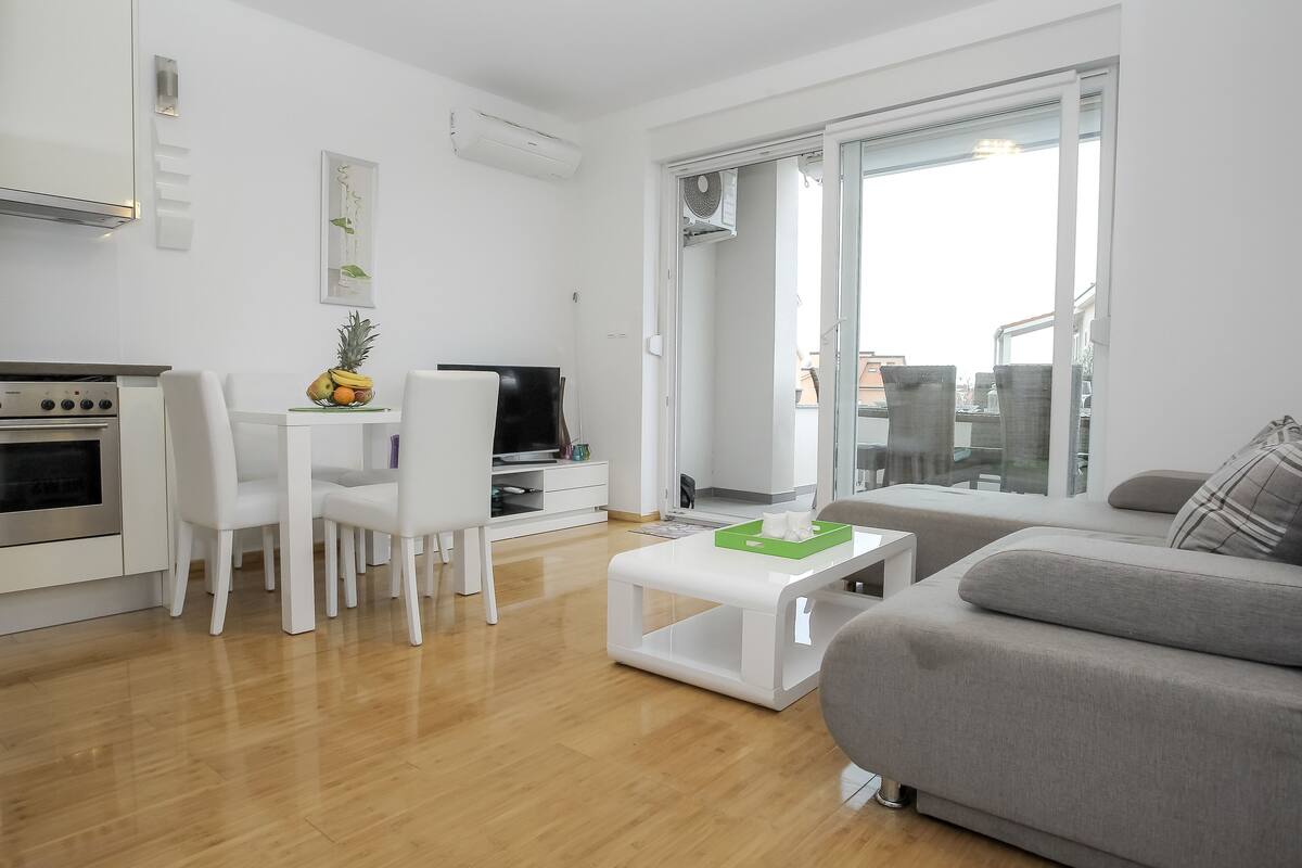 Deluxe Apartment, Terrace | Living area | Flat-screen TV