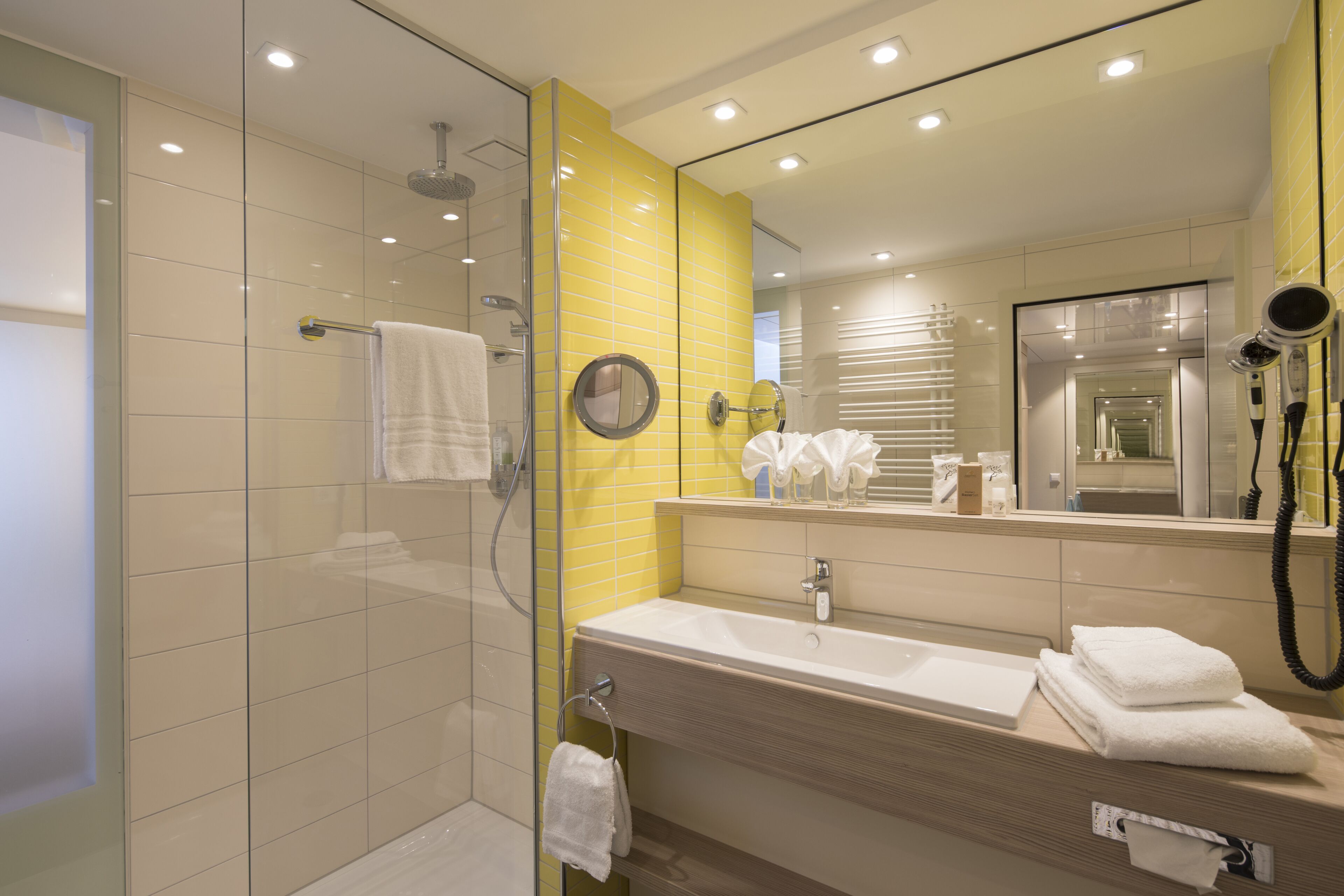 hair dryer, bathrobes, slippers, towels