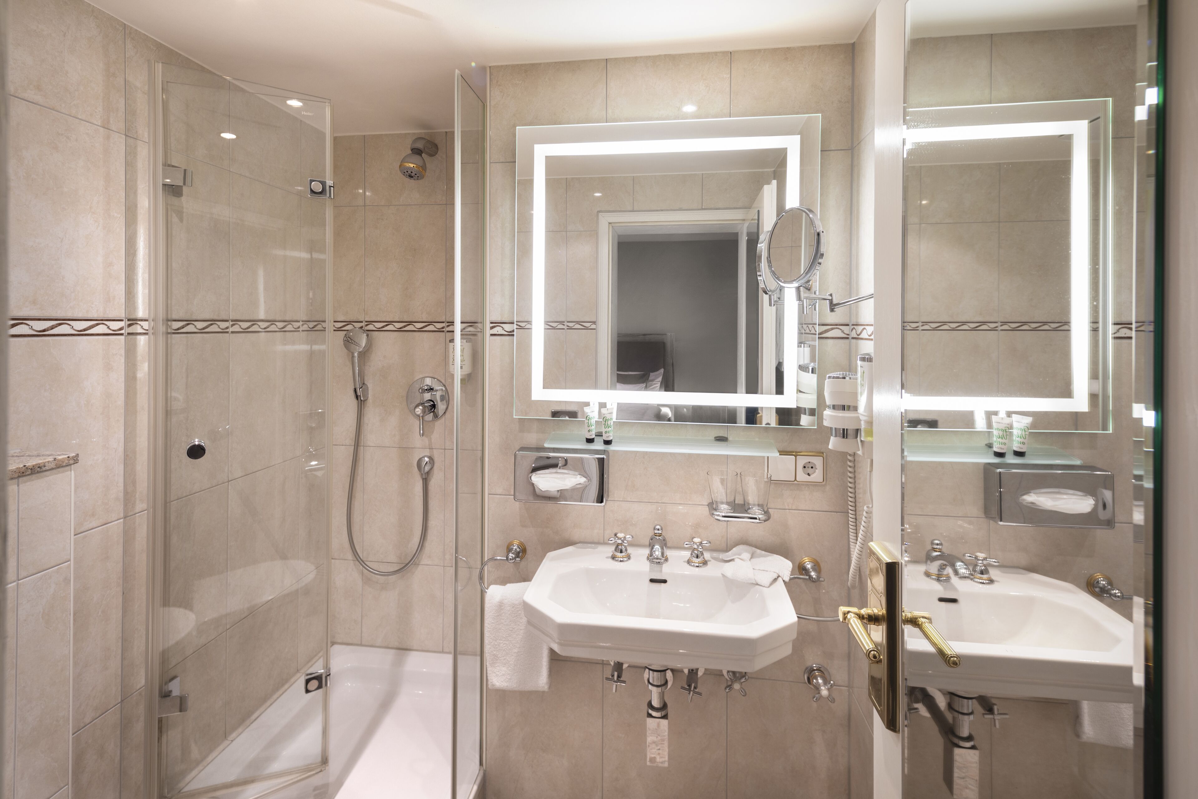 hair dryer, bathrobes, slippers, towels