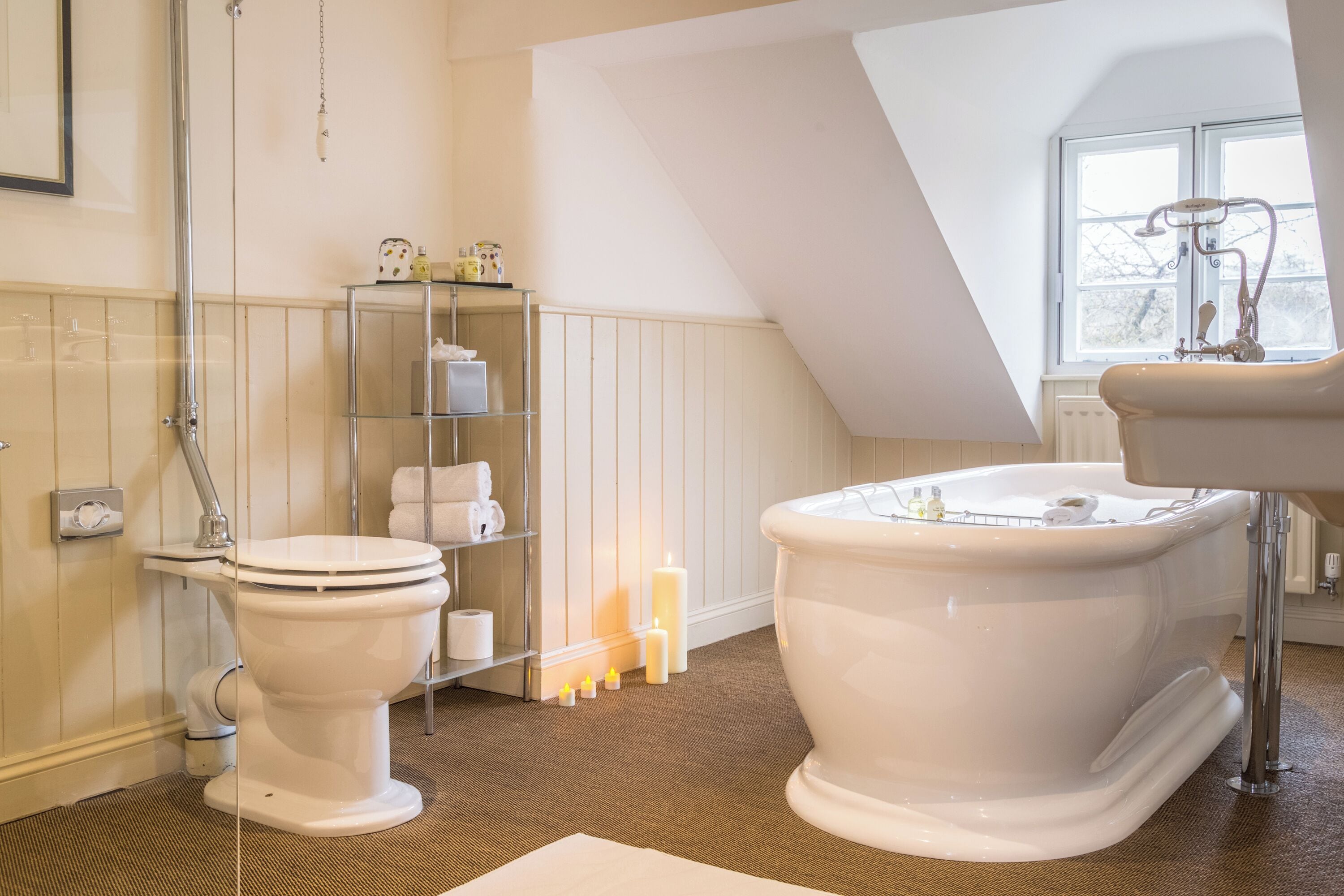 designer toiletries, hair dryer, bathrobes, towels