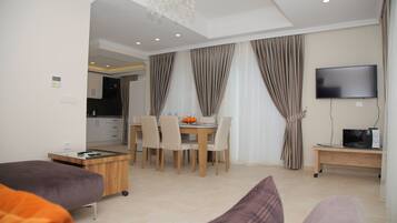 Villa, Non Smoking | Living room | Flat-screen TV