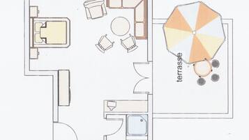 A floor plan of a hotel room with a terrace area.