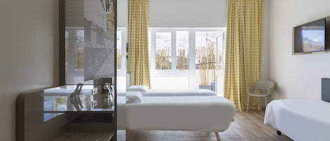 Standard Triple Room, Accessible, Non Smoking | In-room safe, desk, blackout drapes, soundproofing
