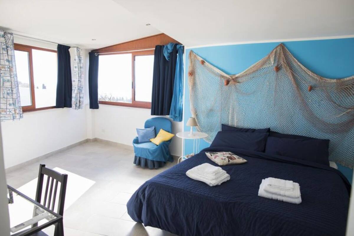 Double Room, 1 Queen Bed with Sofa bed, Resort View (Mare) | Minibar, in-room safe, desk, blackout drapes