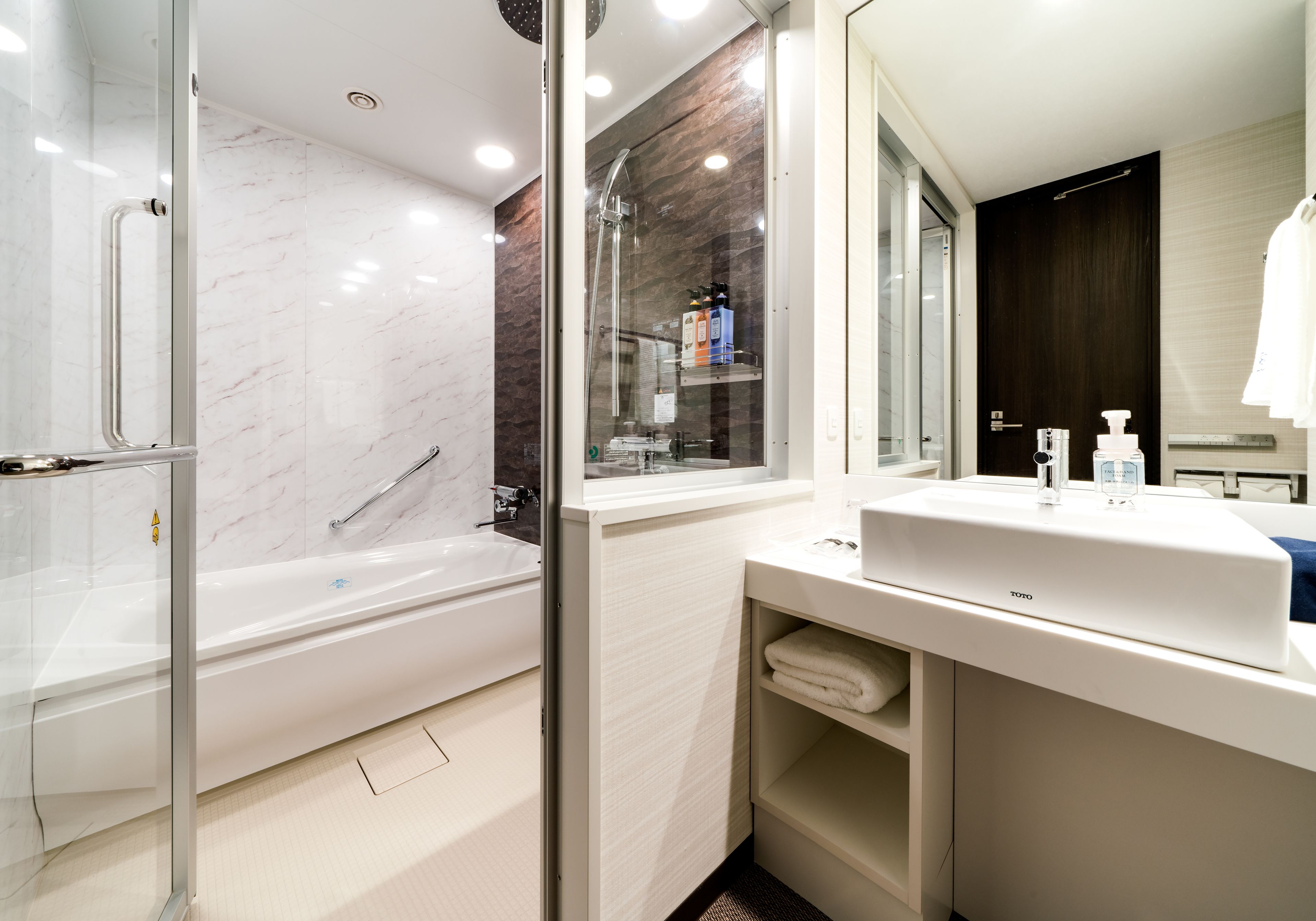 separate bathtub and shower, deep-soaking bathtub, free toiletries