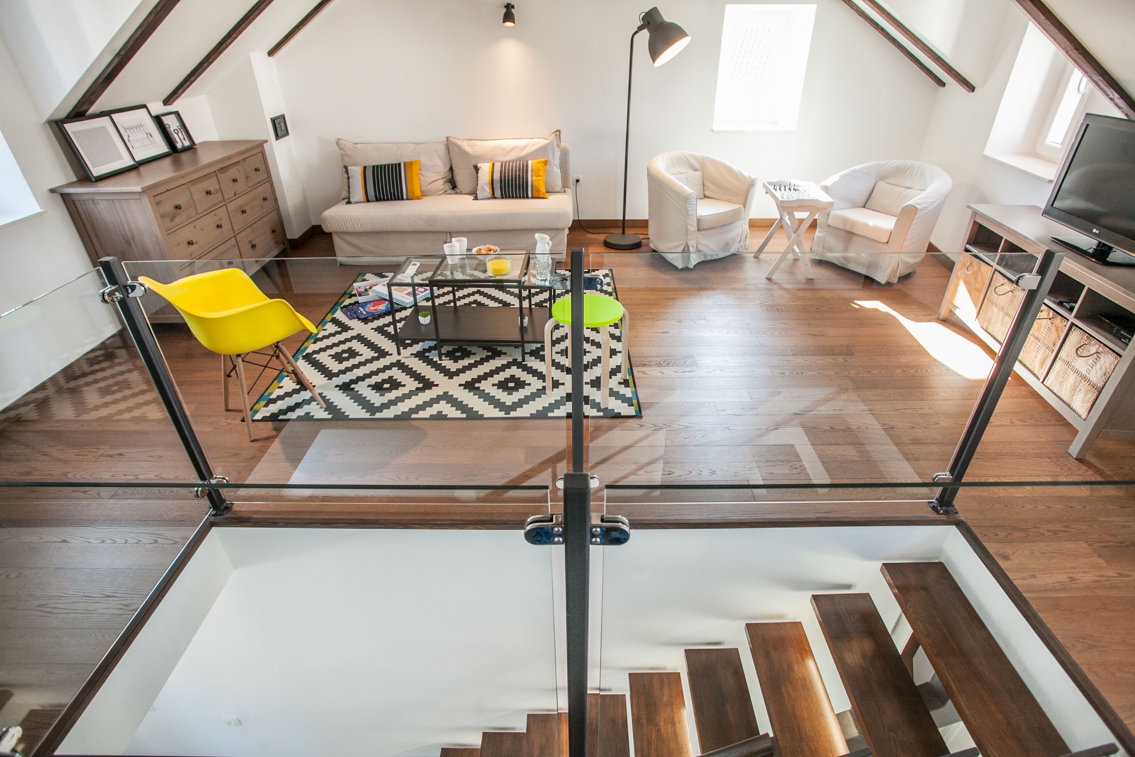 Villa | Living area | 32-inch flat-screen TV with satellite channels, TV, books