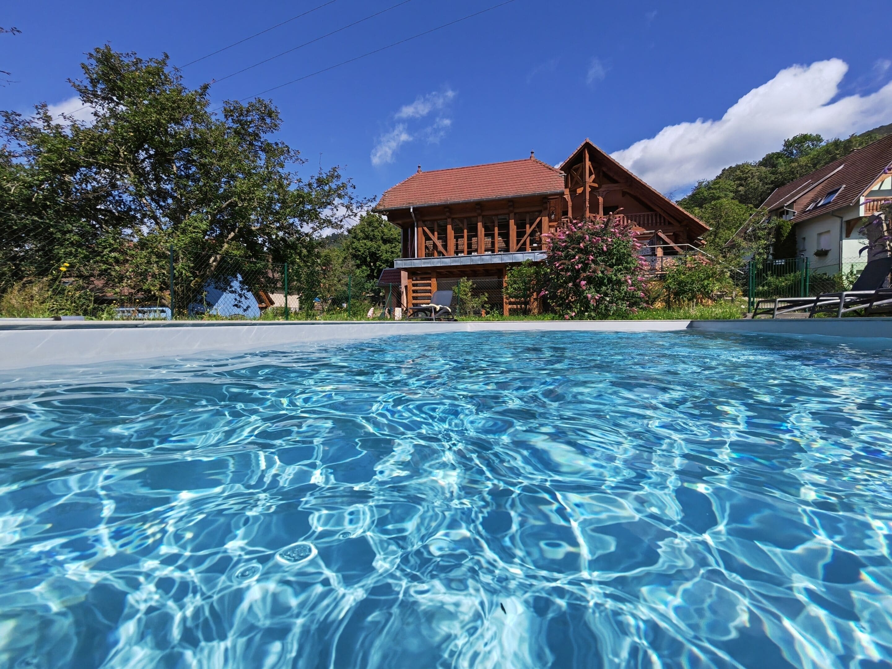 Outdoor pool, a heated pool, sun loungers