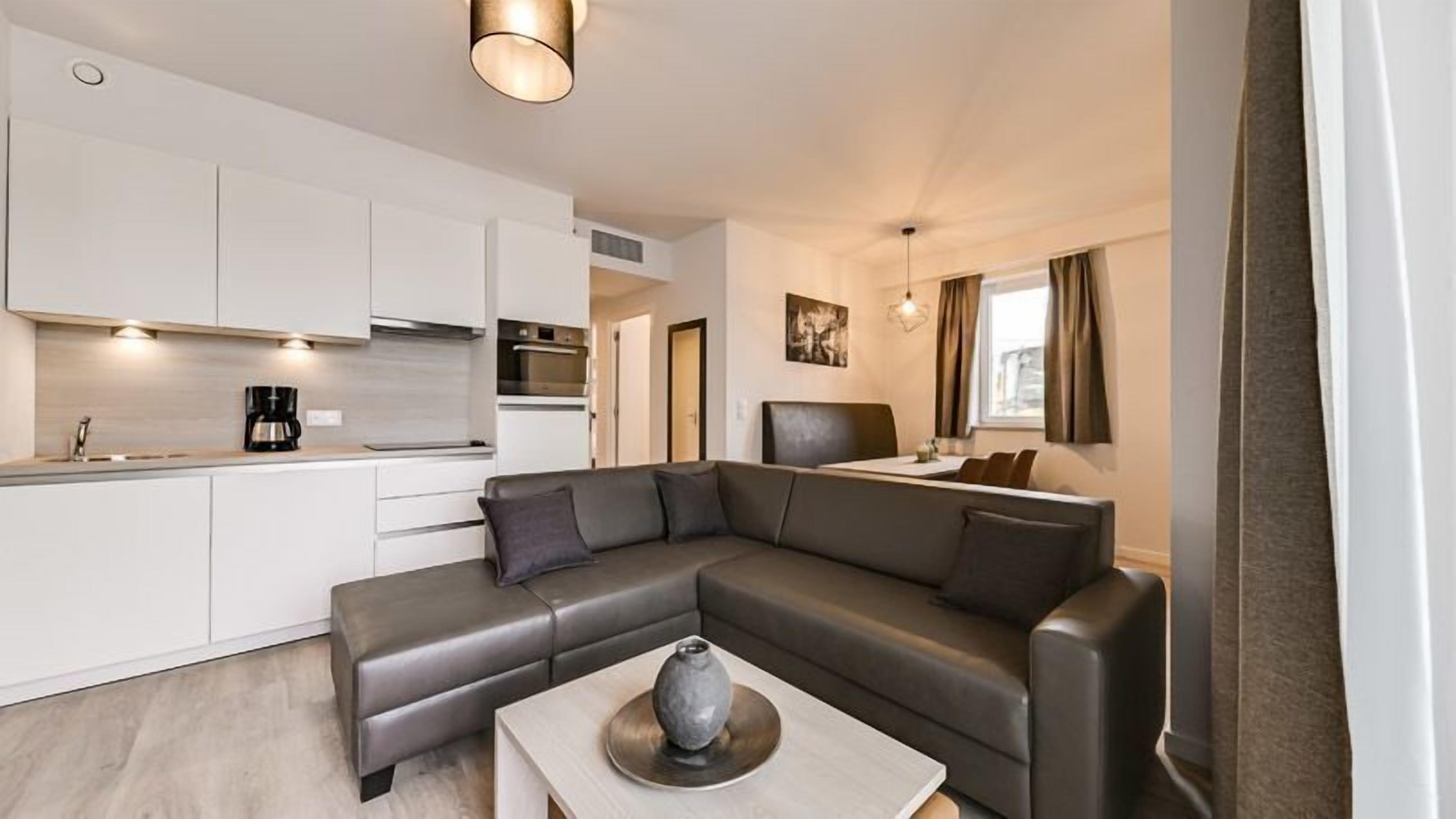 Spacious suite | 6p | Wohnbereich | Flachbildfernseher