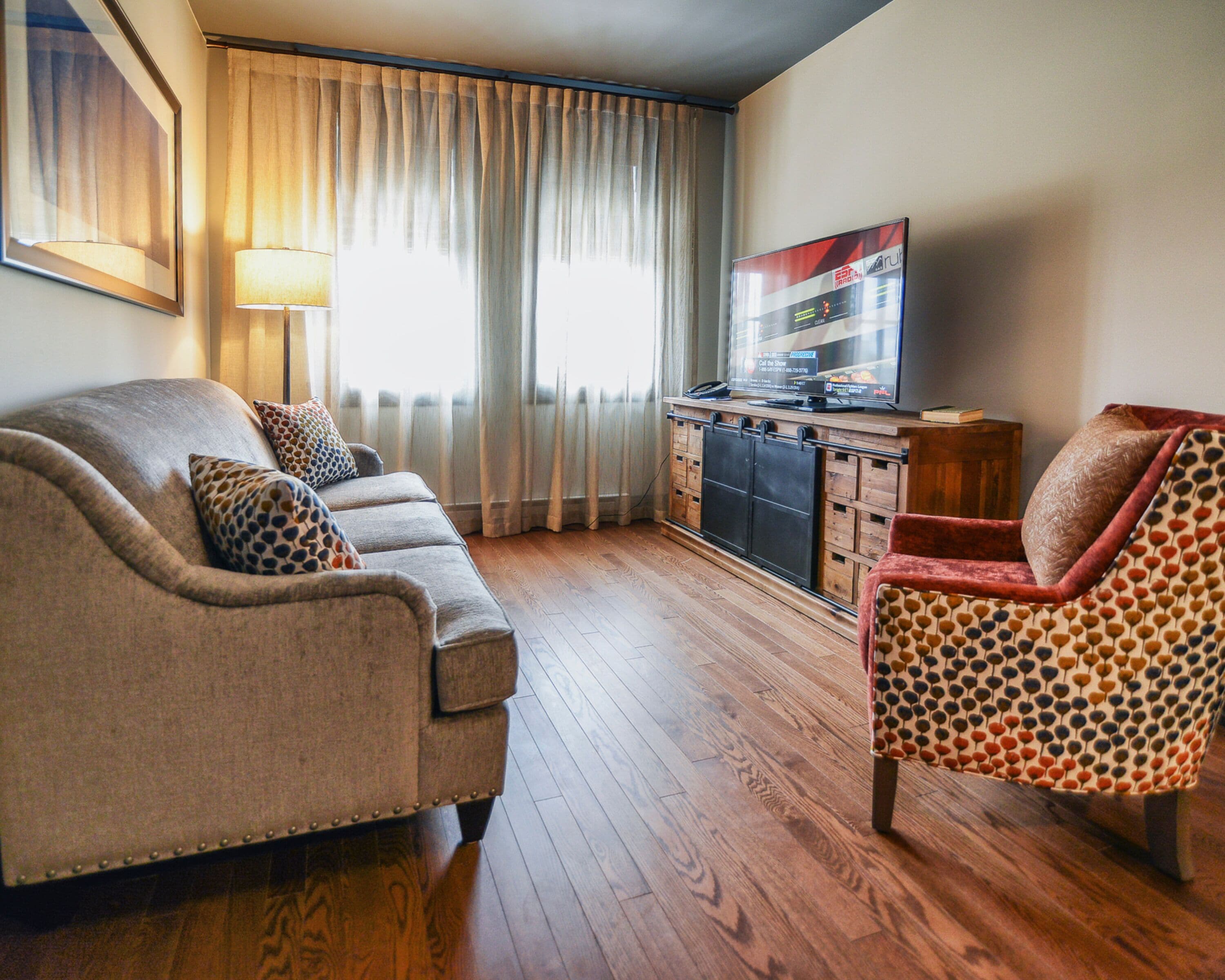 premier suite, 1 king bed, non smoking | living area | flat-screen tv