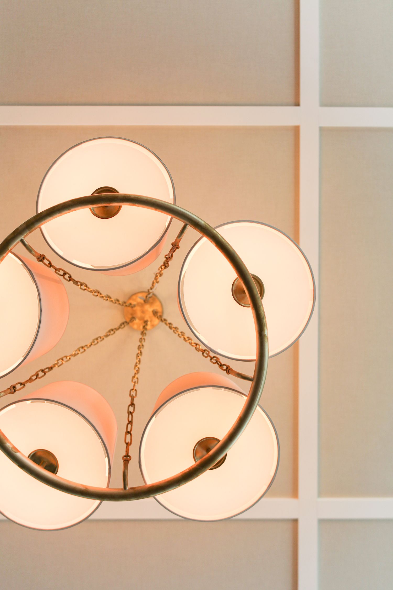 A ceiling light fixture with a circular design and multiple bulbs.