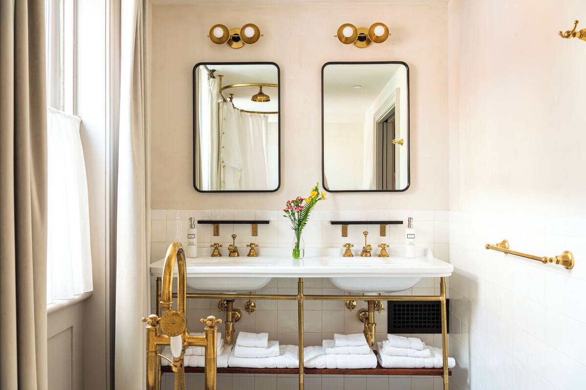 luxury room, 1 king bed, fireplace (john st) | bathroom | shower, rainfall showerhead, designer toiletries, hair dryer