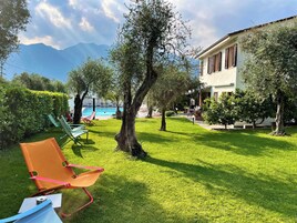 Seasonal outdoor pool, pool loungers