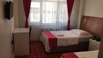 Standard Twin Room | Desk, blackout drapes, rollaway beds, free WiFi