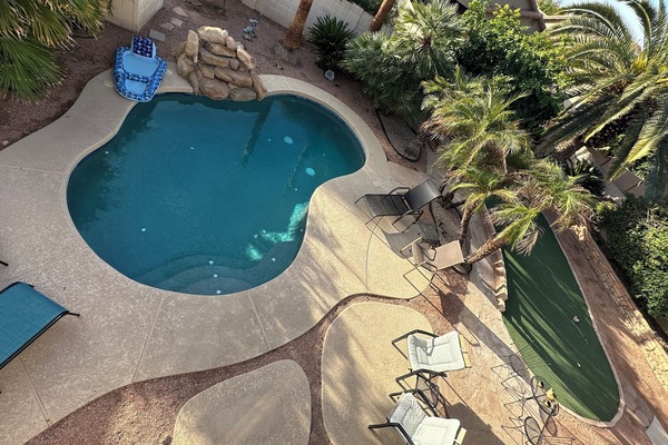 Backyard Oasis with the perfect combination of sun, shade, water and fun!