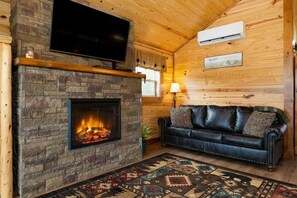 Televisión LCD, chimenea y reproductor de DVD