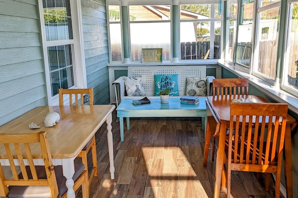 Front sunroom is great for watching the boats going through the bay.