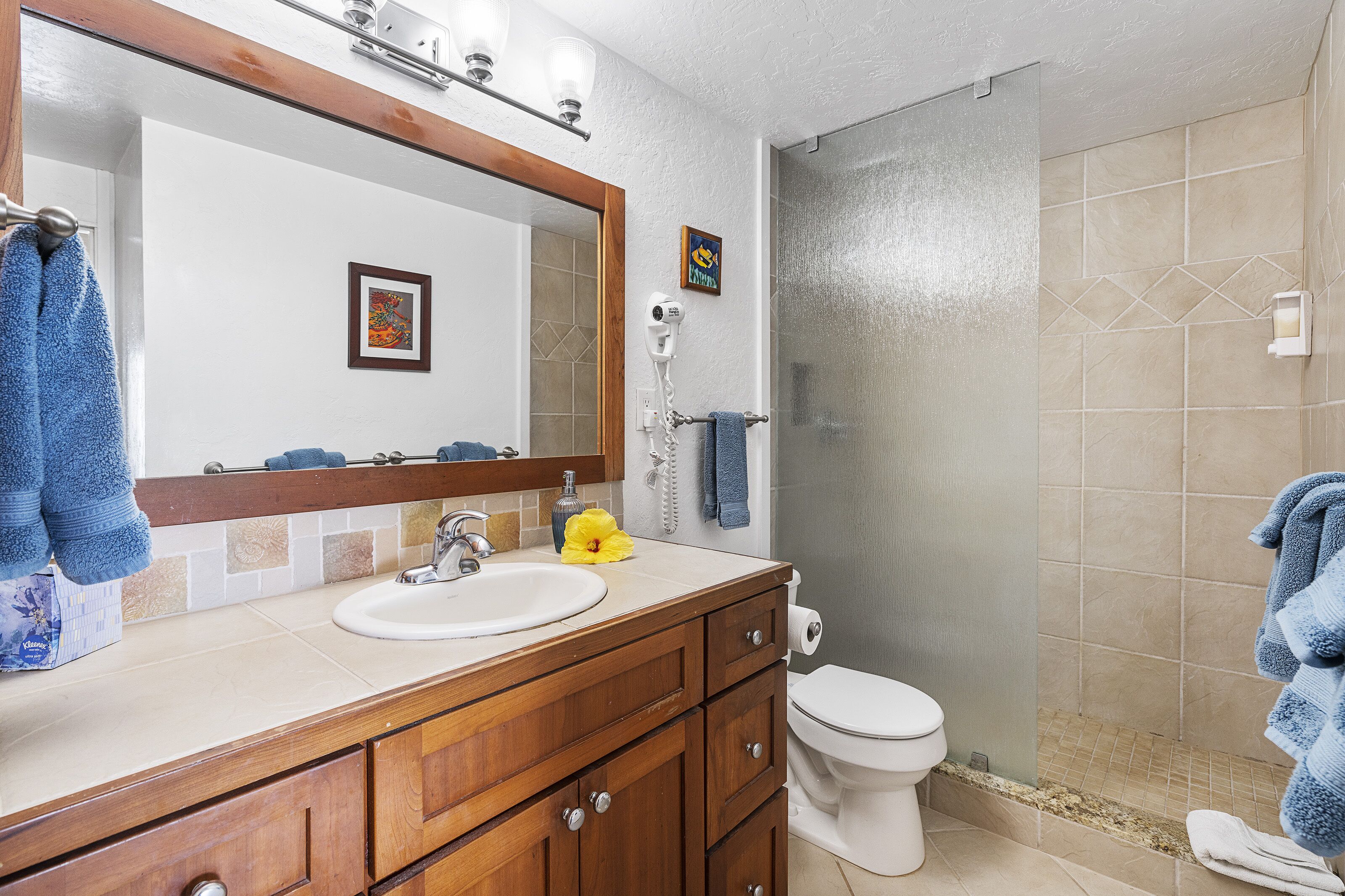 Shower, hair dryer, towels, soap