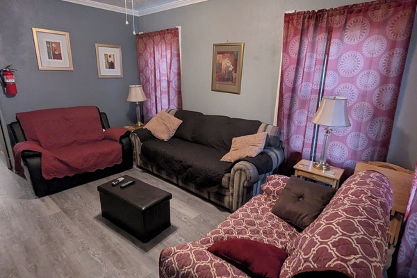 Two double recliners and a queen pull out sofa bed