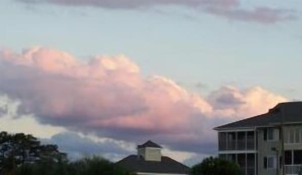 A residential area with houses and a clear sky with clouds. - Waterway Landing Ground Floor End Unit in Gated Community (North Myrtle Beach)