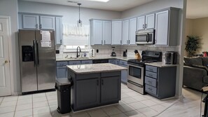 Fridge, microwave, oven, stovetop - Make memories in this spacious home, short walk to the beach and Surfside Pier. (Surfside Beach)