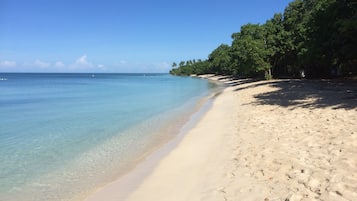 On the beach, sun-loungers, beach towels