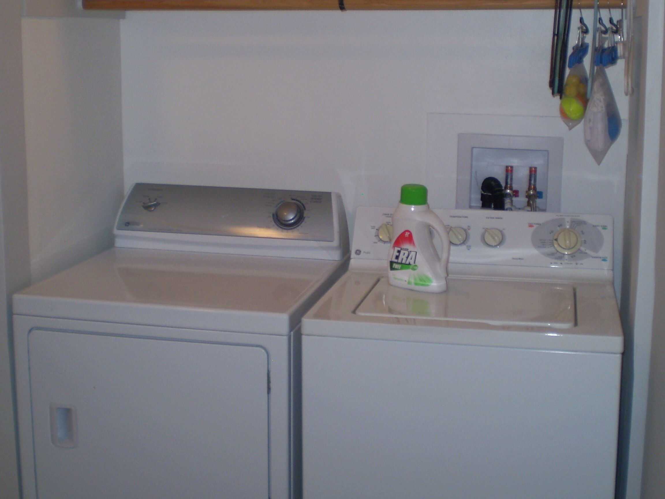A laundry area with a washing machine and a dryer.