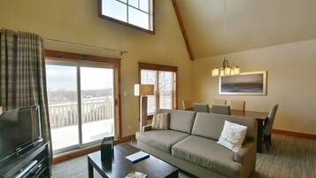 Flat-screen TV, fireplace, video-game console, DVD player