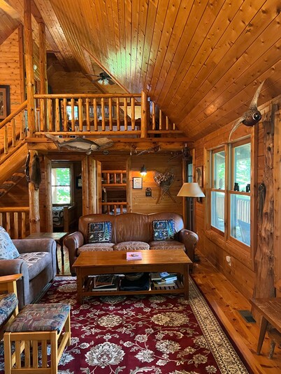 A beautiful log cabin home on Lake Huron, amazing lake views, hot tub, game room