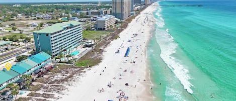On the beach, sun-loungers