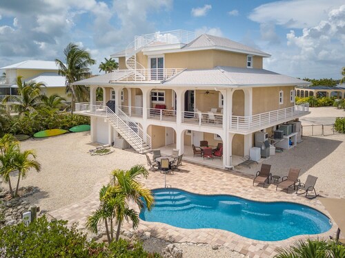 Extraordinary 7br waterfront custom home, pool 56'dock ,ice machine,kayaks,bikes