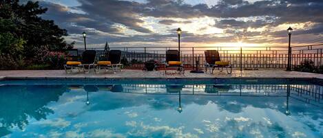 Outdoor pool, pool umbrellas, sun loungers