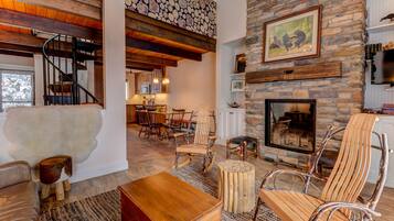 Smart TV, chimenea, reproductor de DVD y libros