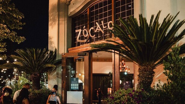 A building with a large illuminated sign reading "ZOOCA". - 1890s Gem | Prime Midtown Hub | Walk to Everything (Sacramento)