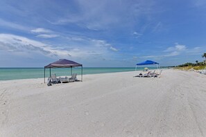 On the beach, beach umbrellas - Unit #218 Sand Cay Beach Resort  Gulf Front (Longboat Key)