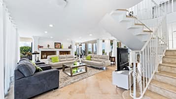 TV, fireplace, books, stereo