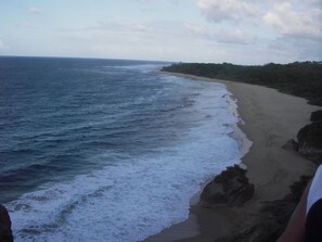 On the beach, sun-loungers, beach towels