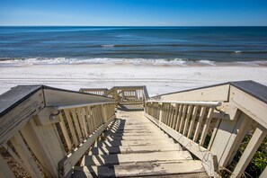 On the beach, sun loungers, beach umbrellas