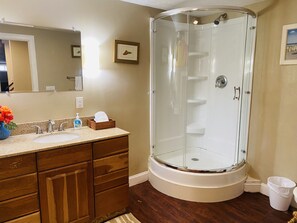 Combined shower/tub, hair dryer, towels, soap