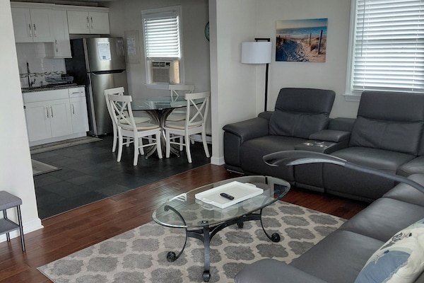 View of living room/kitchen from front door