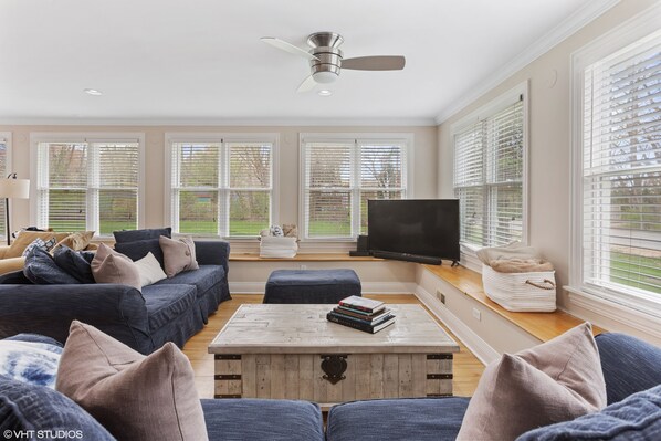 Smart TV, fireplace, foosball, books